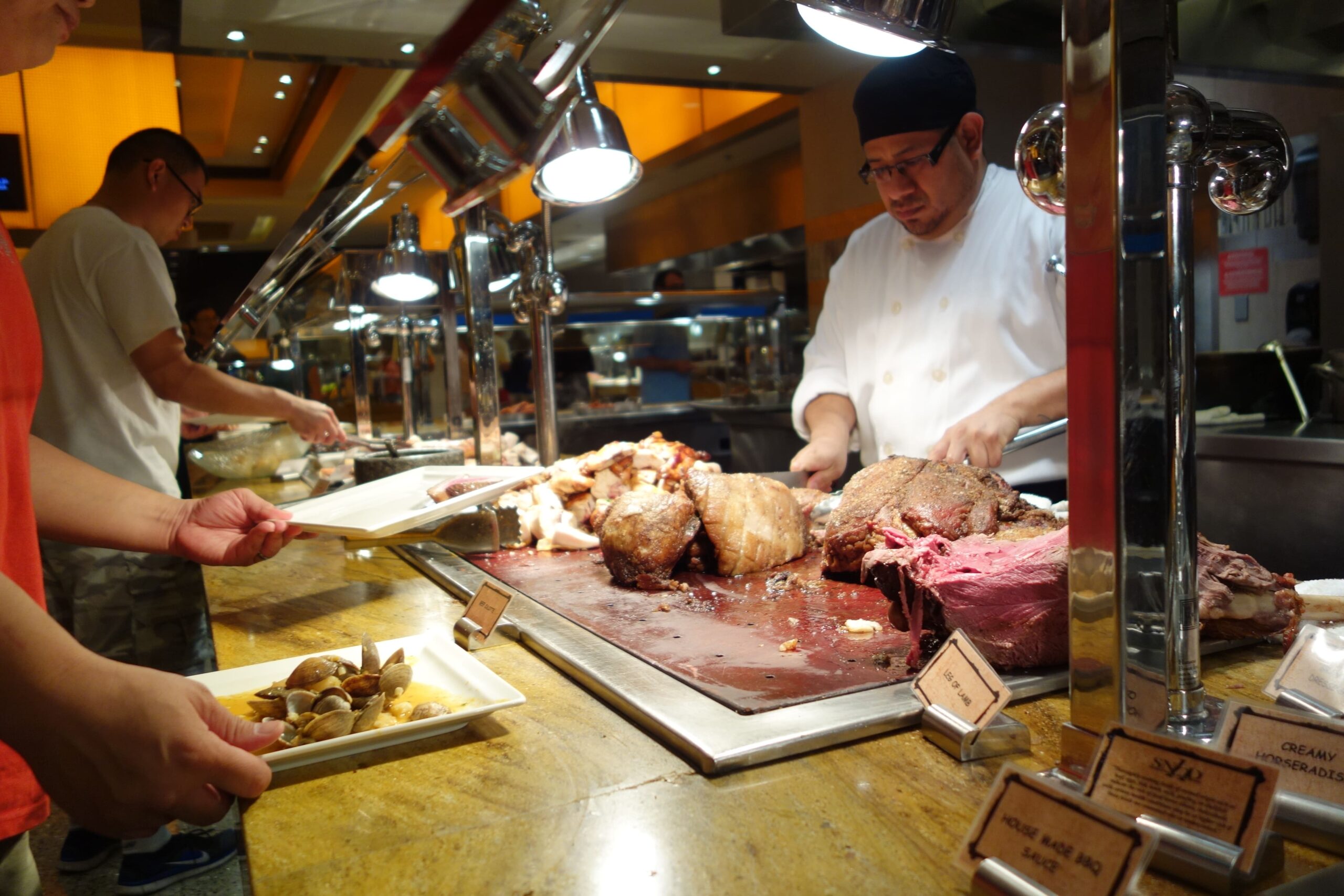 A chef cutting a freshly made leg of lamb at the Wicked Spoon Buffet at the Cosmopolitan Las Vegas